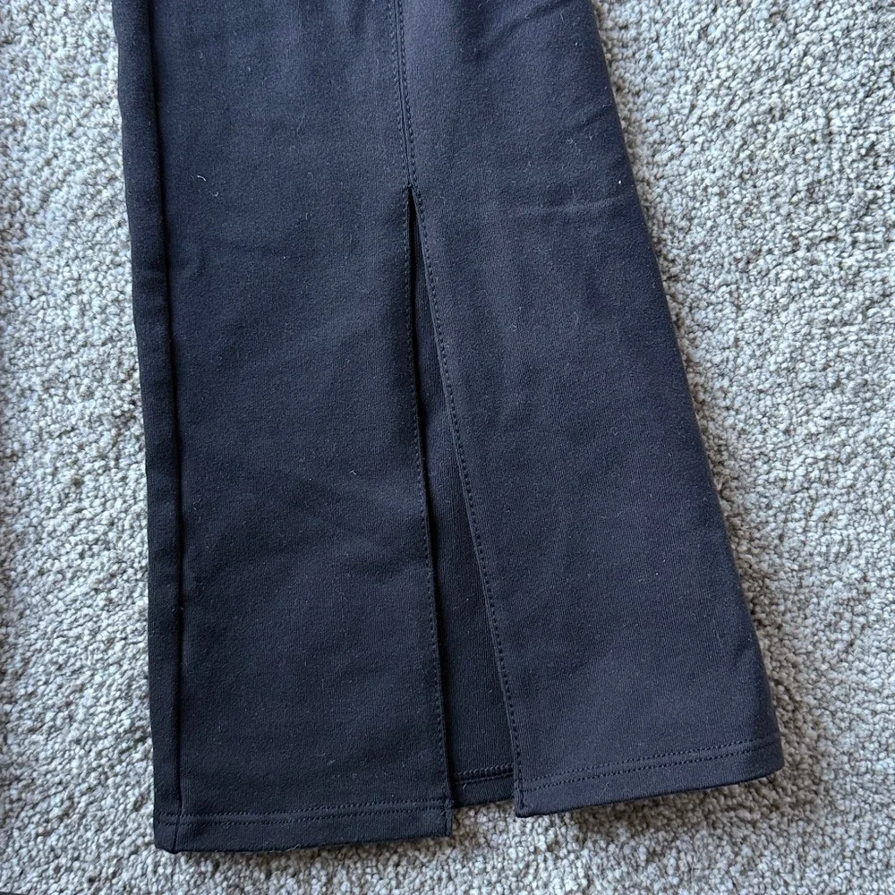 ALO Yoga Women’s Flutter Flare Black Leggings Size XS Split Hem - Picture 3 of 5